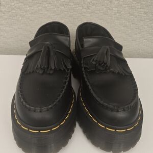Dr. Martens Black Tassel Platform Loafers with Yellow Stitching